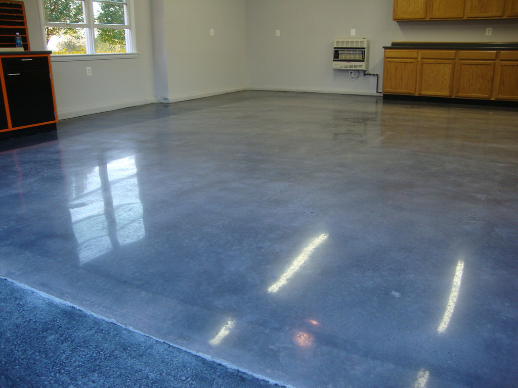 A decorative stain on a residential concrete garage floor using Xtreme Polishing Systems products.