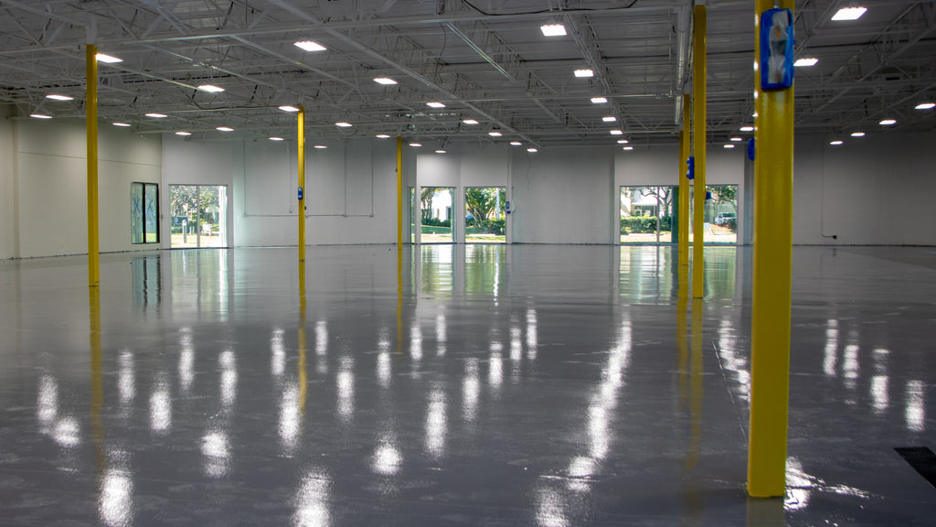 A large industrial epoxy resin flooring with moisture barrier solution installed.