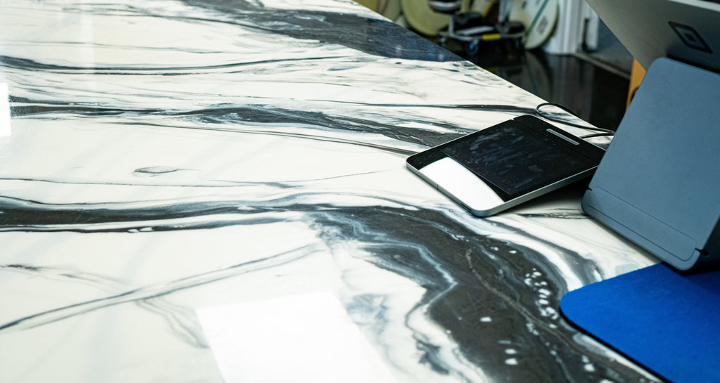 A metallic epoxy resin stone countertop mimic in a commercial space.