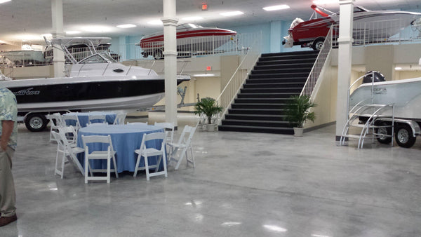 A polished concrete floor inside a boating facility.