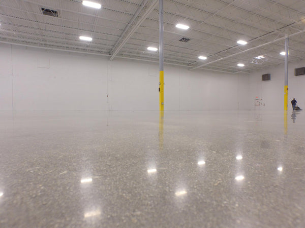A highly reflective polished concrete commercial floor.