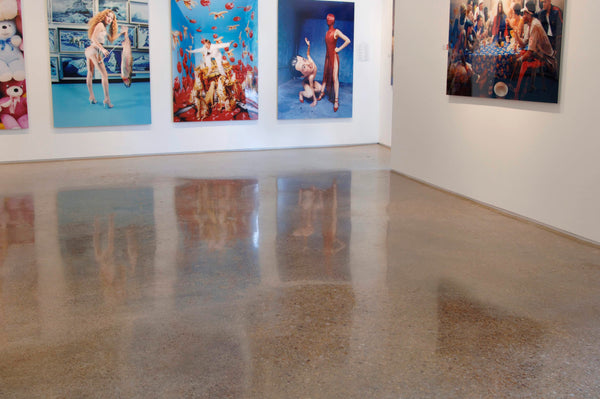 An image of an art gallery with a high-shine polished concrete floor.