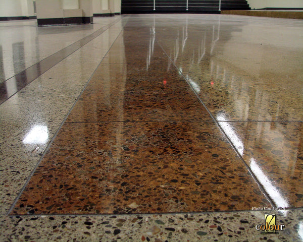 An exposed aggregate floor inside a commercial office building.