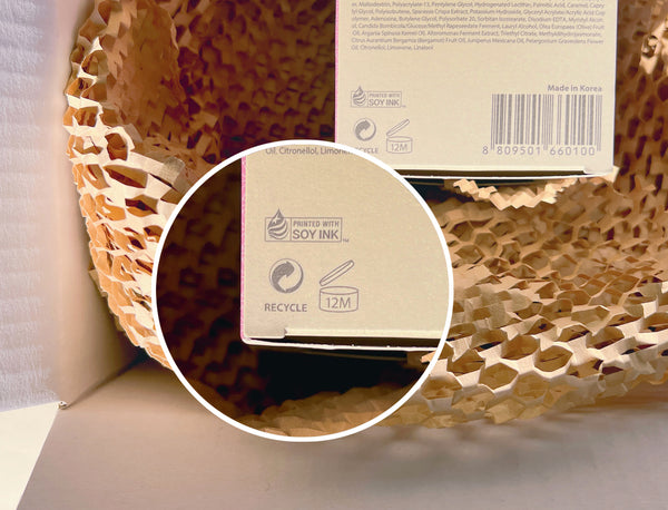 Close-up view of a Blithe product package highlighting the soy ink printing logo, emphasizing BLITHE COSMETICS' commitment to eco-friendly and sustainable printing practices.