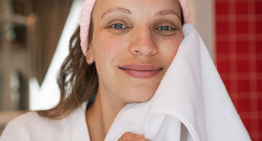 Close-up photo of a woman's chin area, demonstrating the vibrant, youthful skin achieved through proper nighttime skincare."