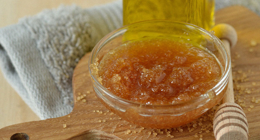 Image of a bowl filled with pure, golden honey, emphasizing its natural texture and color, showcasing its use as a key ingredient in DIY skincare recipes for its antibacterial and moisturizing properties.