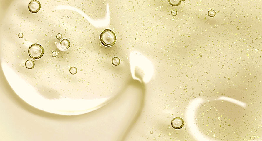 Close-up image of a serum texture, highlighting its smooth and glossy appearance.