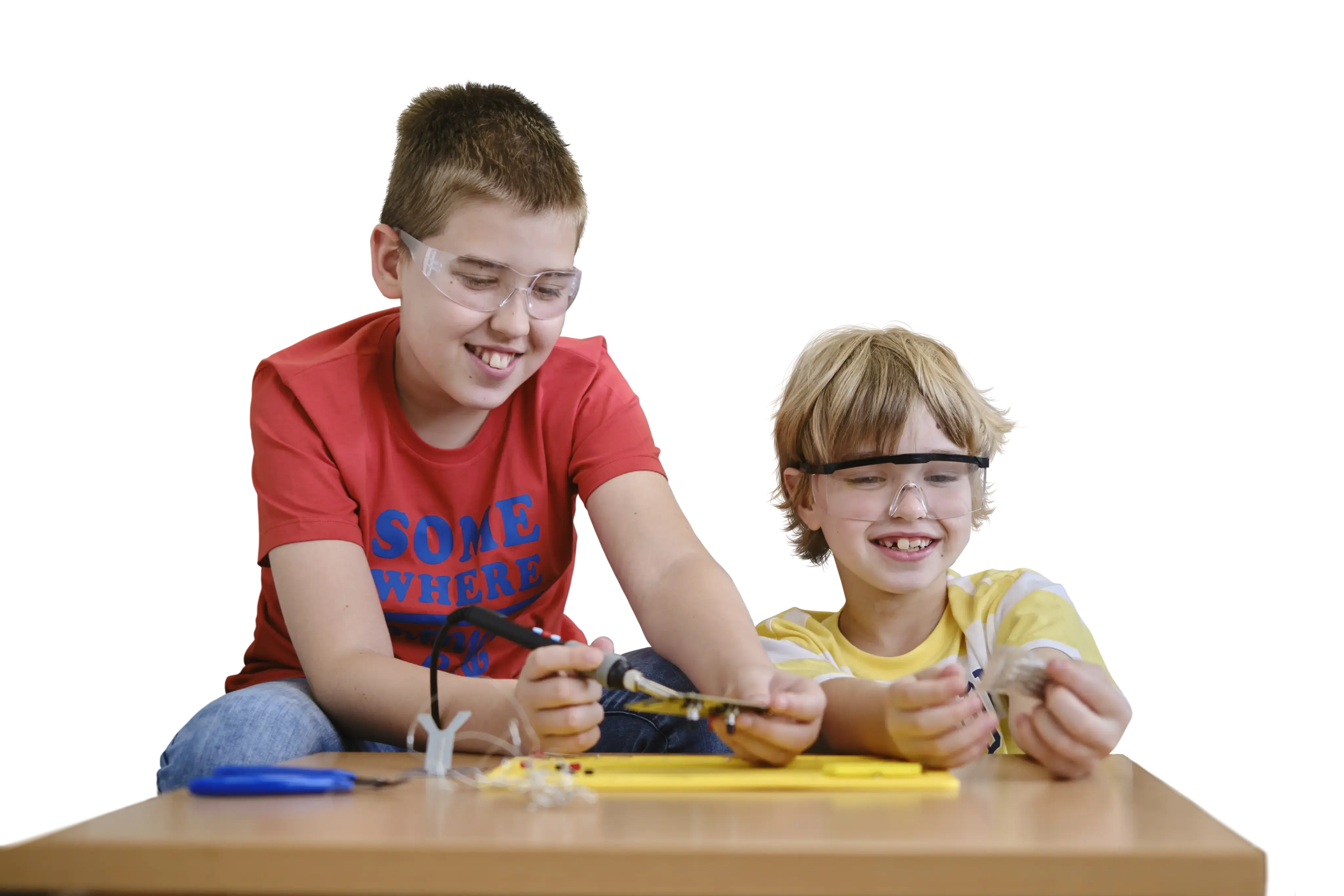 Kids having fun soldering.