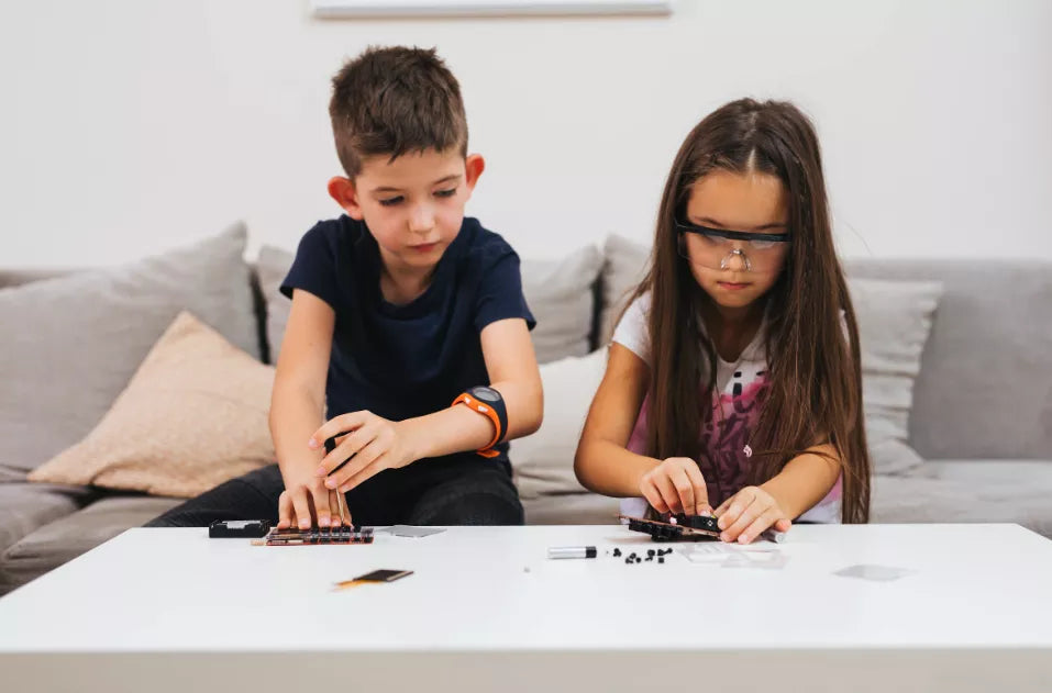 Kids assembling their DIY electronics gadgets