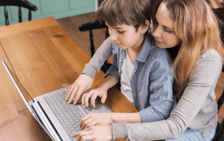 Parents coding together with their kids to better teach STEM skills