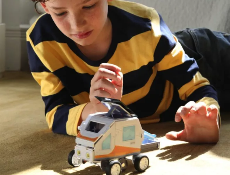 Kid playing with Little Passports box - KiwiCo alternative