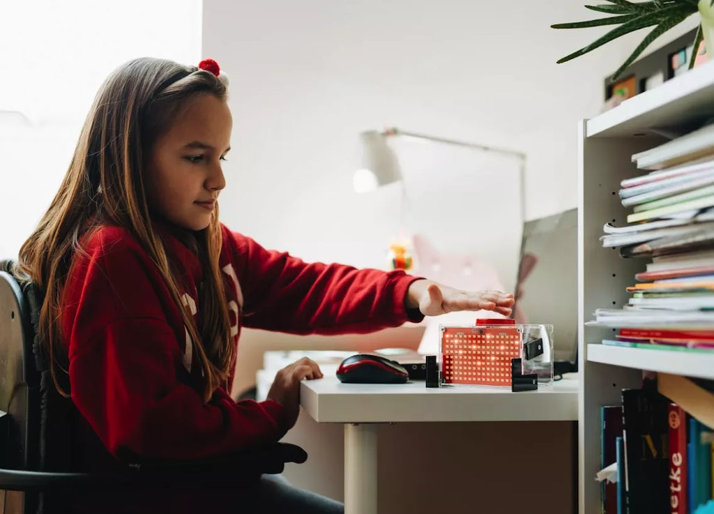 Kid playing with Spencer - A DIY voice assistant for kids