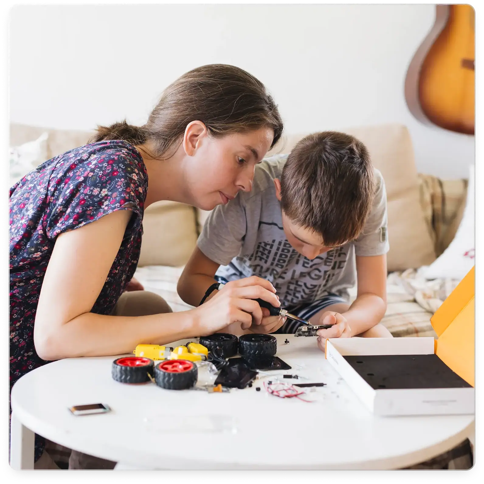 Mother and child building Stem project