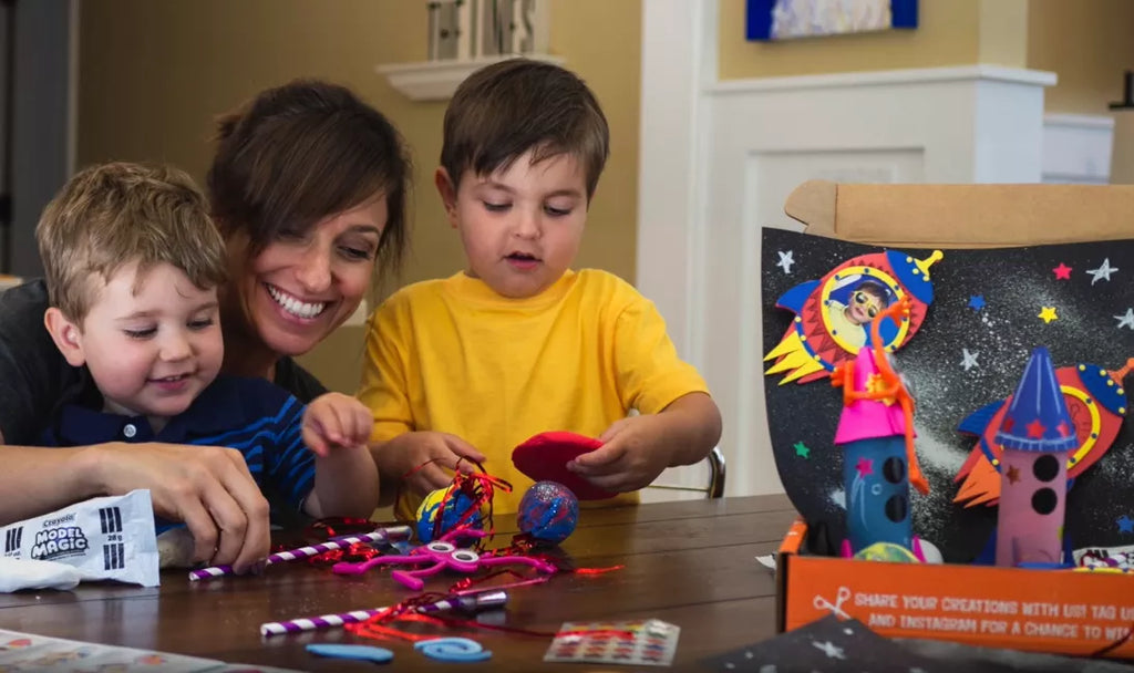 Kids playing with their WeCraftBox DIY crafts