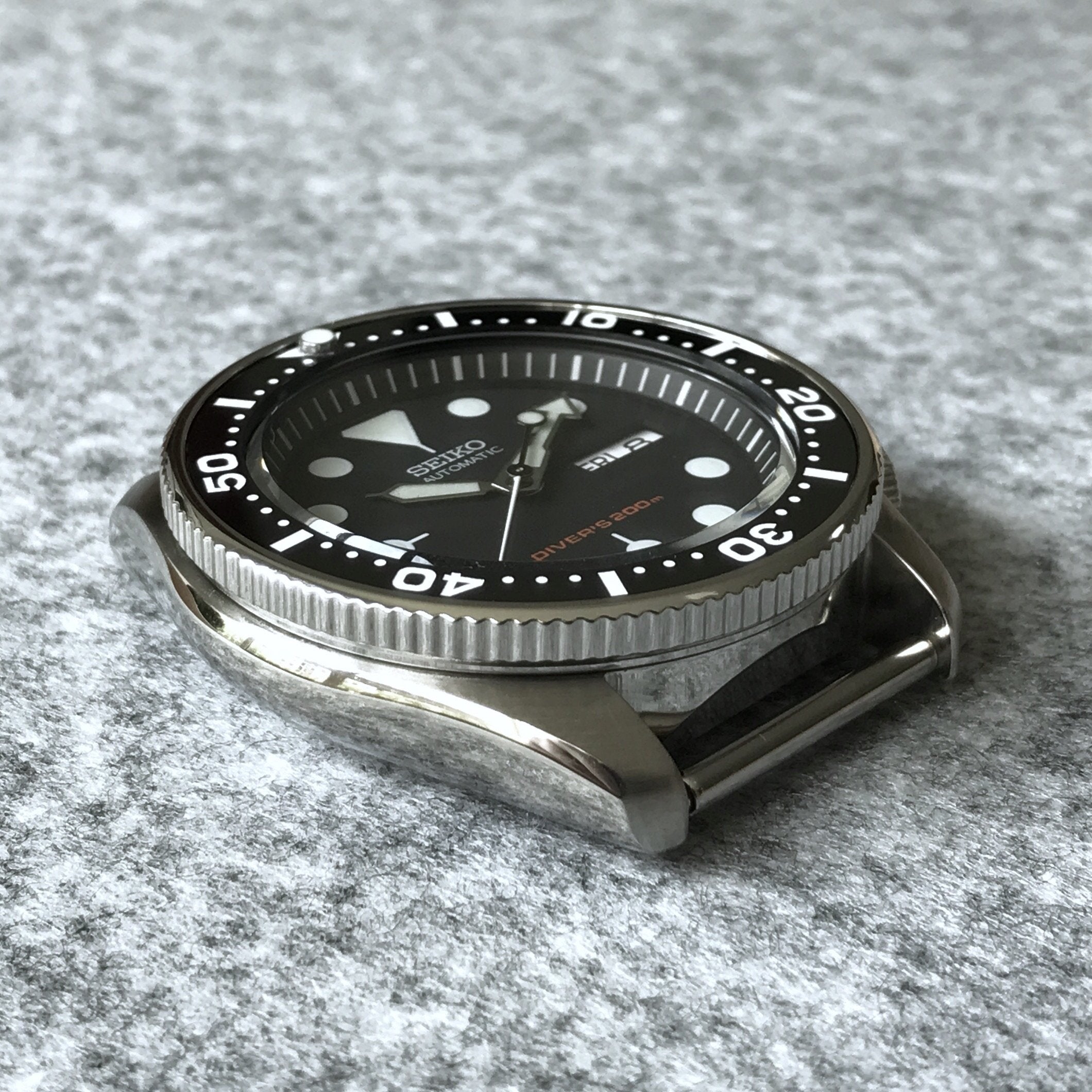 Arriba 46+ imagen seiko coin edge bezel