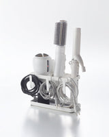 Prop photo showing Haircare Appliance Holder with various props.