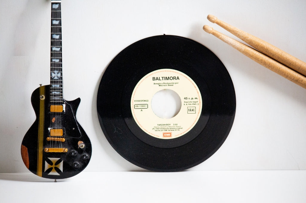 Guitar, record, and drums to be incorporate music into home design