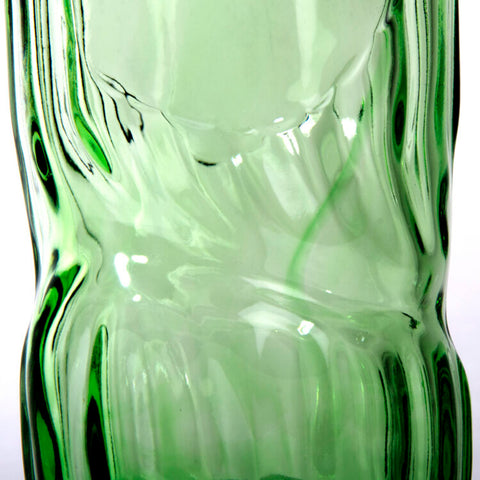 Close up of wonky glass River Rock whisky bottle 