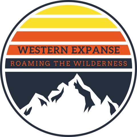 Western Expanse LOGO With text "Western Expanse, Roaming the Wilderness" Horizontal stripes in Yellow, Orange, Blue with negative space graphic mountain range within a circle