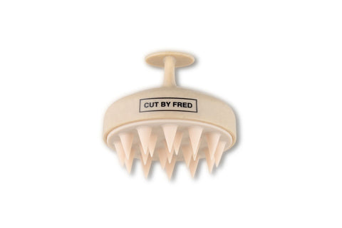 Stimulating scalp brush