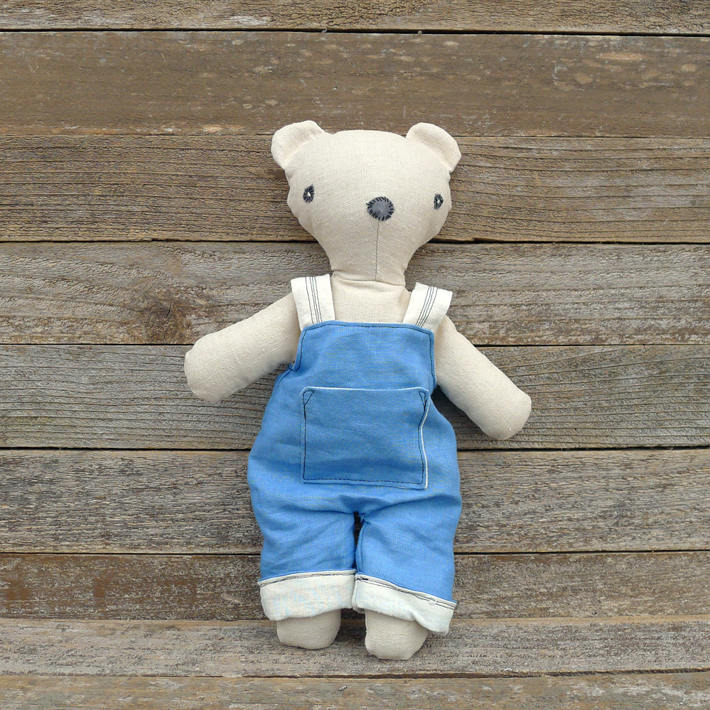 teddy bear with overalls