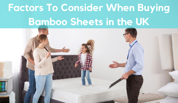 A young couple with baby in the bedding shop in Uk checking some important factors of best bamboo sheets with shops assistant