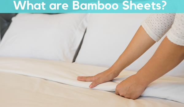 Lady cover her bed with bamboo sheets