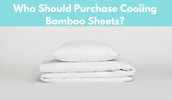 a white color pillow over a bamboo bed sheet