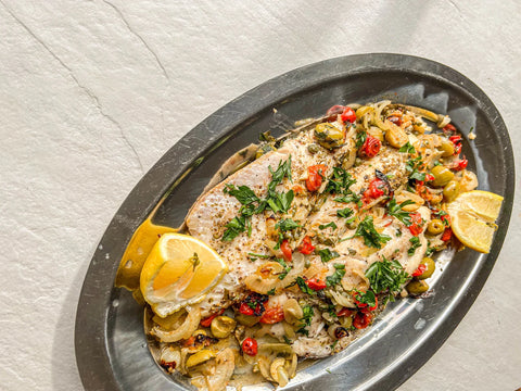 Roasted wild walleye with capers, olives and tomatoes