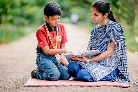 Mother and son reading together