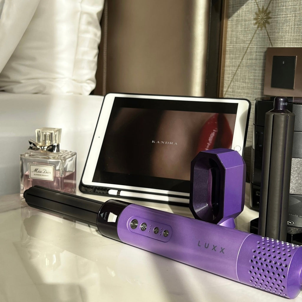 Luxx Air Pro 2 Amethyst - a styling tool inspired by amethyst gems. Features a tapered barrel, a detachable nozzle, and customizable temperature and speed settings.