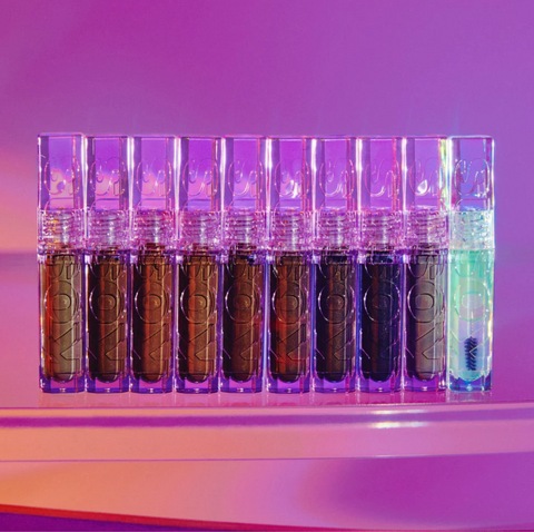 lineup of 10 colorful brow gels on purple background. Brand is kosas