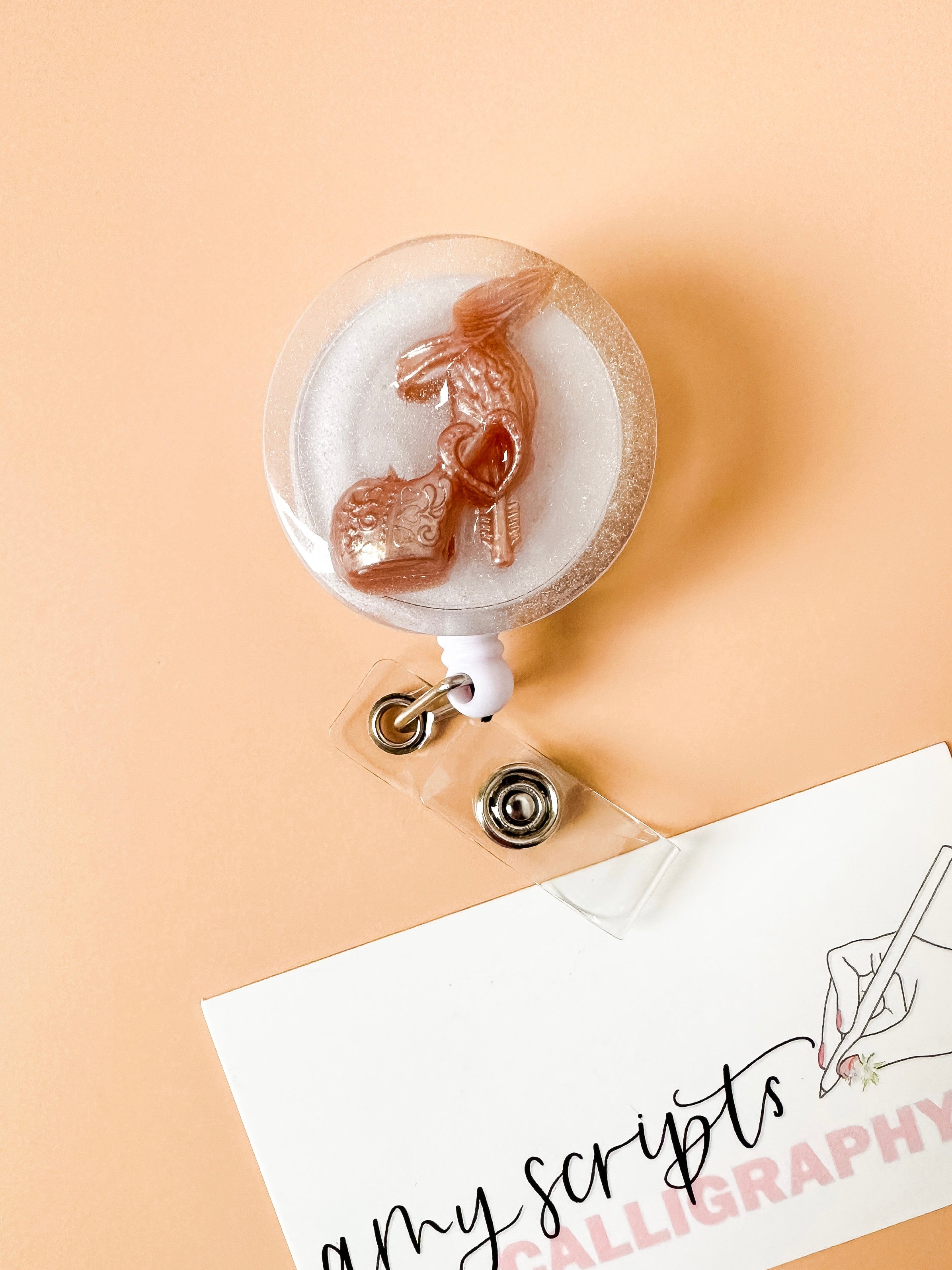 gold barbie shoe badge reel