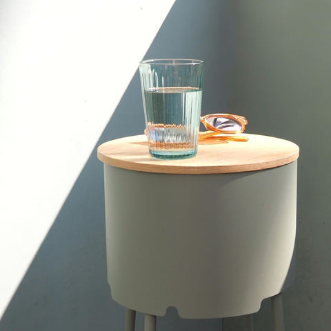 closed vase holder as a bedside table