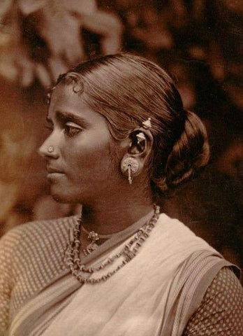 bugadi in history, tamil woman wearing bugadi earrings