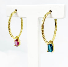 Load image into Gallery viewer, Our 18K Gold hoop earrings gave a little twist to a classic must-have in your jewelry box. Gemstones in this picture: Rhodolite and London Blue Topaz.
