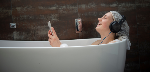 Woman relaxing in bathtub