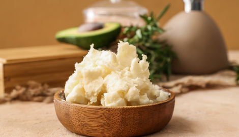 Raw shea butter in bowl