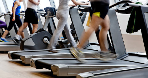 A picture of people running on a treadmill