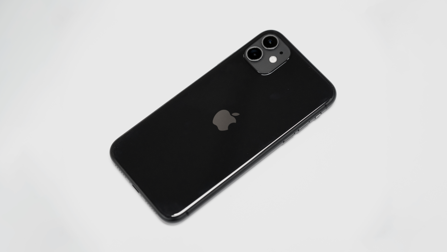the back of a black iphone 11