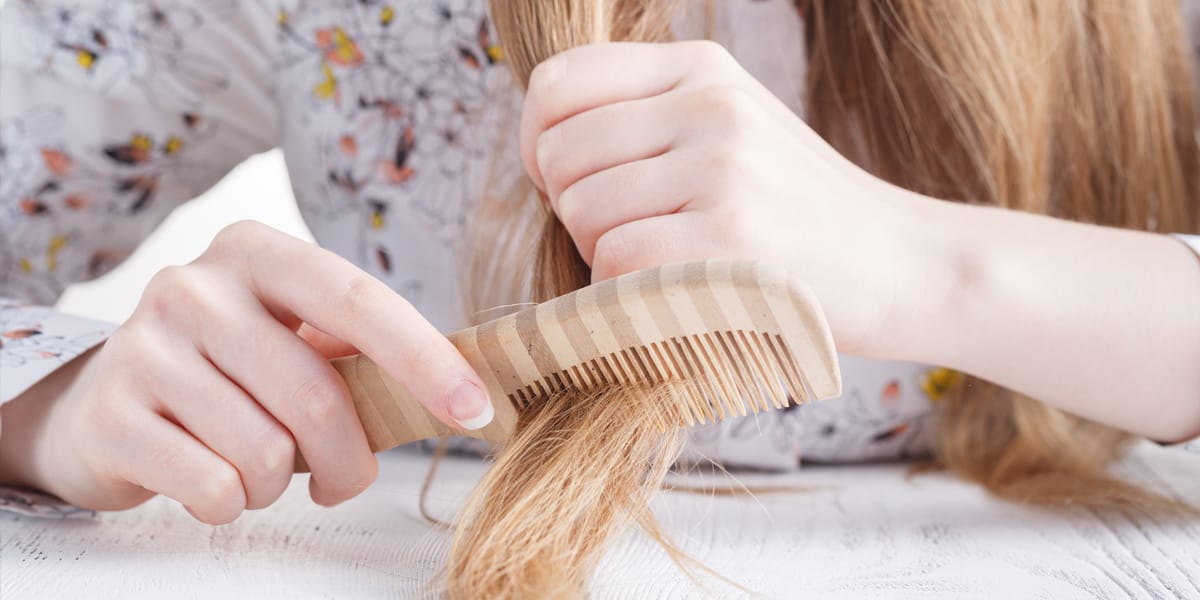 Girl brushing her hair