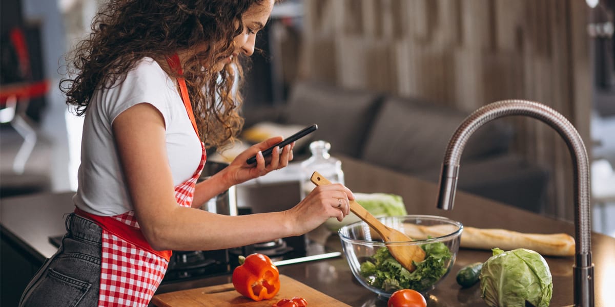 Lady cooking a vegan, plant based meal