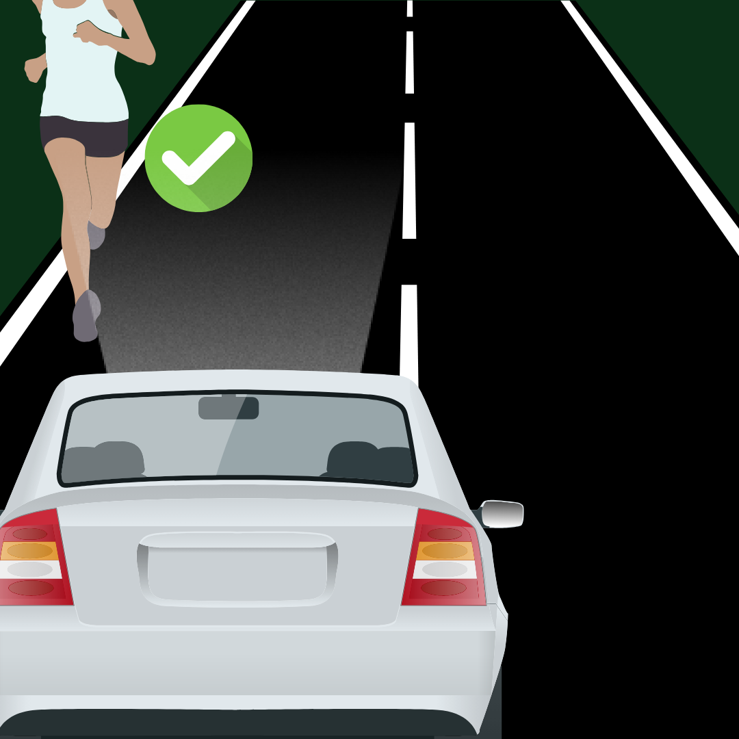 runner on road with car facing opposing directions