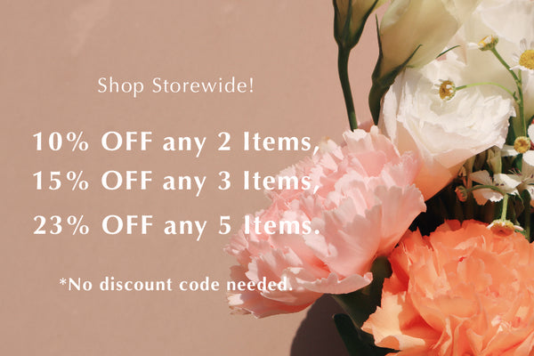 Jewelry details of mothers day promo with beautiful flowers