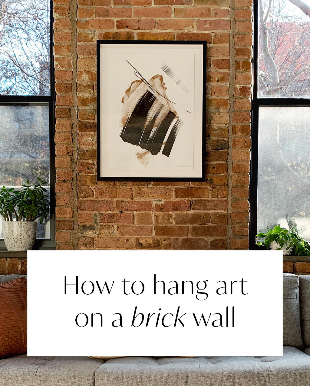 How to hang art on a brick wall