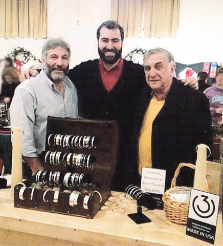 Picture of the 3U founders with a display of 3U silver Bangles