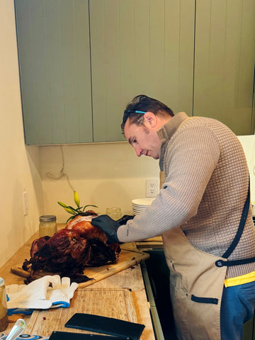 Sonny's Farm team member carves regeneratively farmed turkey