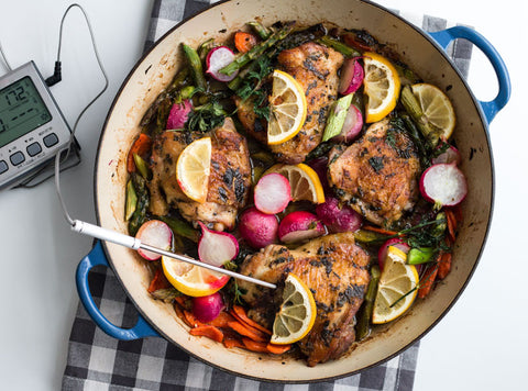 Sonny's Farm Pastured Free-Range chicken in a Dutch Oven with a meat thermometer