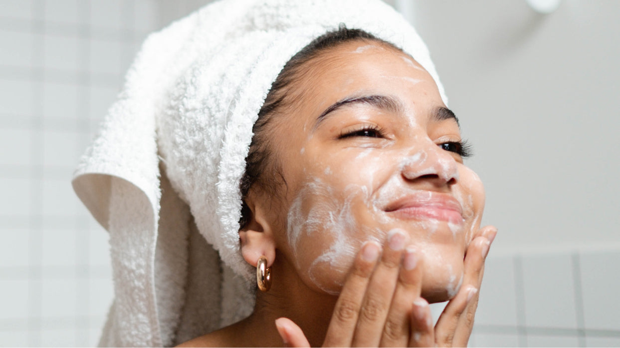 Woman washing face