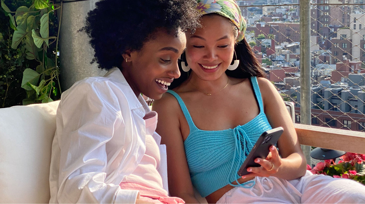 Two women reading an email